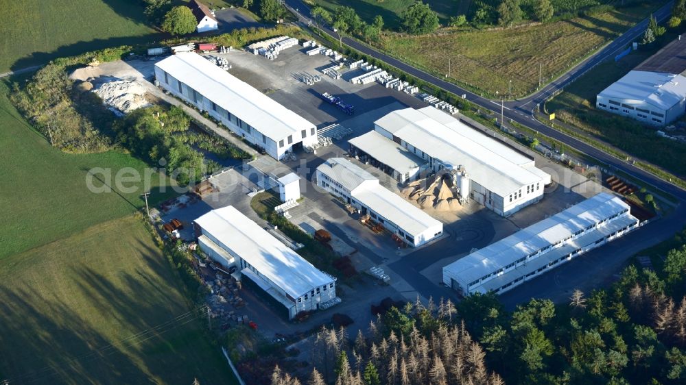 Schöneberg from the bird's eye view: Building and production halls on the premises of SELING Beton-Naturstein GmbH in Schoeneberg in the state Rhineland-Palatinate, Germany