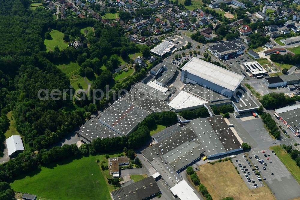 Sundern (Sauerland) from the bird's eye view: Building and production halls on the premises of SEVERIN Elektrogeraete GmbH on Roehre in Sundern (Sauerland) in the state North Rhine-Westphalia, Germany