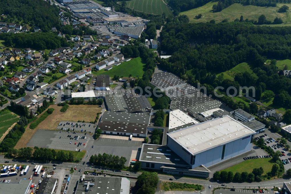 Sundern (Sauerland) from the bird's eye view: Building and production halls on the premises of SEVERIN Elektrogeraete GmbH on Roehre in Sundern (Sauerland) in the state North Rhine-Westphalia, Germany