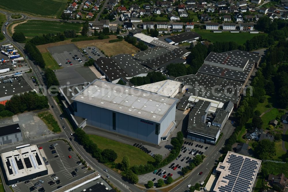 Sundern (Sauerland) from above - Building and production halls on the premises of SEVERIN Elektrogeraete GmbH on Roehre in Sundern (Sauerland) in the state North Rhine-Westphalia, Germany