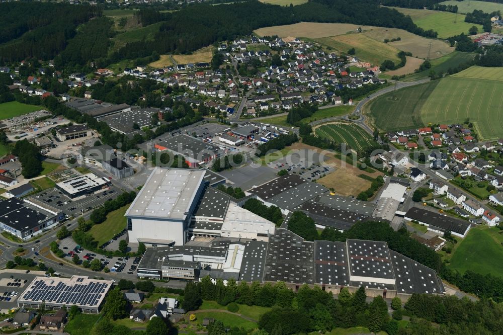 Sundern (Sauerland) from above - Building and production halls on the premises of SEVERIN Elektrogeraete GmbH on Roehre in Sundern (Sauerland) in the state North Rhine-Westphalia, Germany