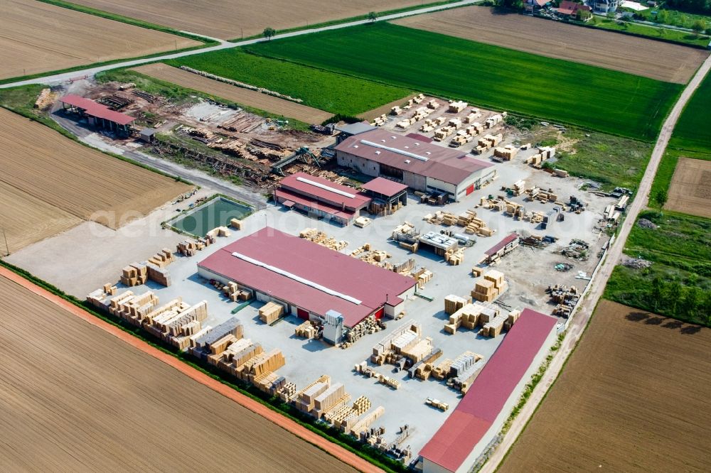 Niederrœdern from the bird's eye view: Building and production halls on the premises of sawery and Palett-Maker KOCHER in NiederrA?dern in Grand Est, France