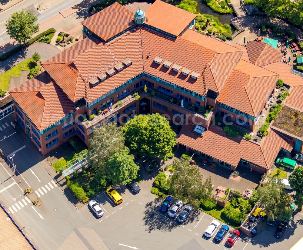 Duisburg from the bird's eye view: Building and production halls on the premises of Sinalco Internat. GmbH & Co.KG on Roemerstrasse in the district Walsum in Duisburg in the state North Rhine-Westphalia, Germany