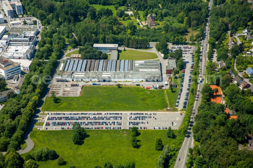 Aerial image Warstein - Building, parking and production halls on the factory premises of the steel fittings PERSTA GmbH in Warstein in North Rhine-Westphalia