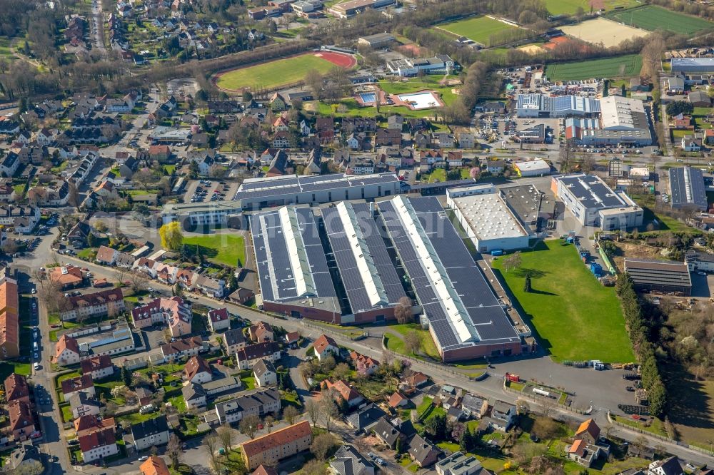 Werl from the bird's eye view: Building and production halls on the premises of Standard-Metallwerke GmbH on Rustigestrasse in the district Westoennen in Werl in the state North Rhine-Westphalia