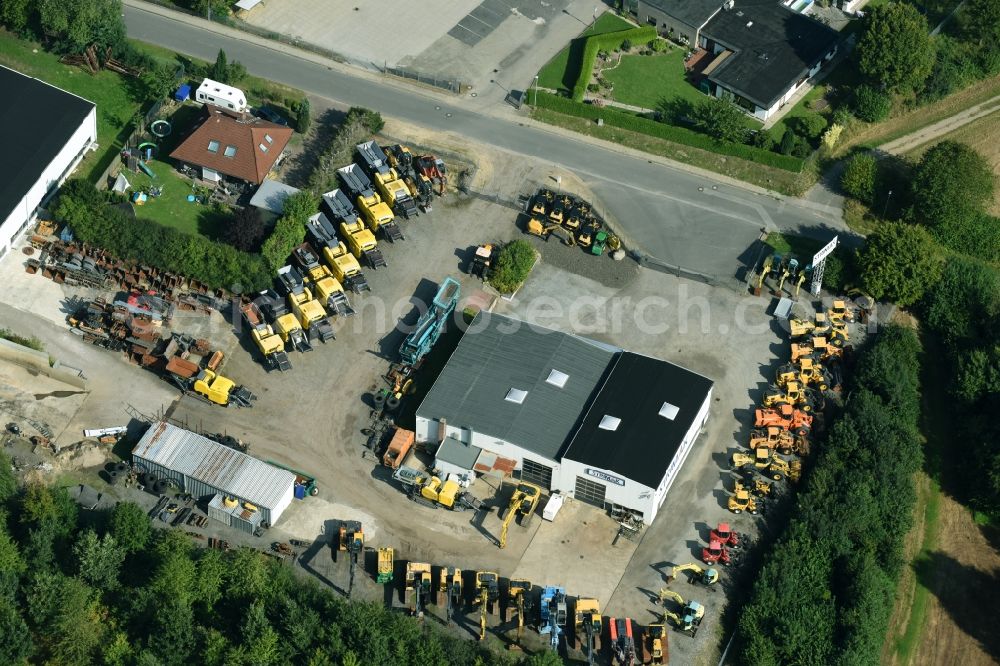 Breitenfelde from above - Building and production halls on the premises of STRIMAK Baumaschinen und Kraftfahrzeuge GmbH an der Bergkoppel in Breitenfelde in the state Schleswig-Holstein