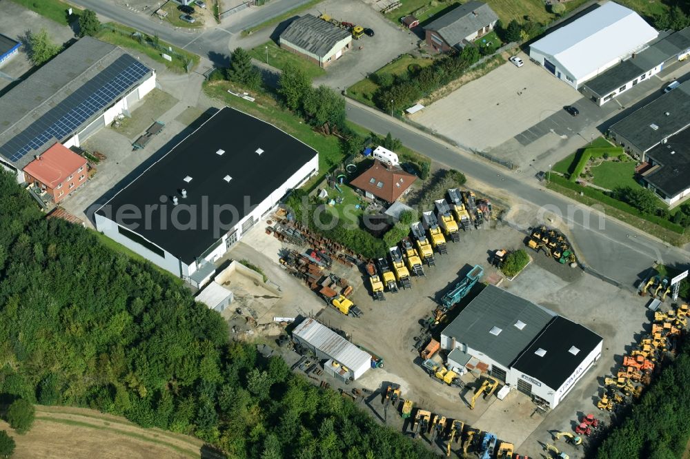 Breitenfelde from the bird's eye view: Building and production halls on the premises of STRIMAK Baumaschinen und Kraftfahrzeuge GmbH an der Bergkoppel in Breitenfelde in the state Schleswig-Holstein