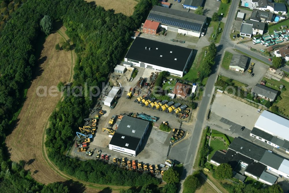 Breitenfelde from above - Building and production halls on the premises of STRIMAK Baumaschinen und Kraftfahrzeuge GmbH an der Bergkoppel in Breitenfelde in the state Schleswig-Holstein