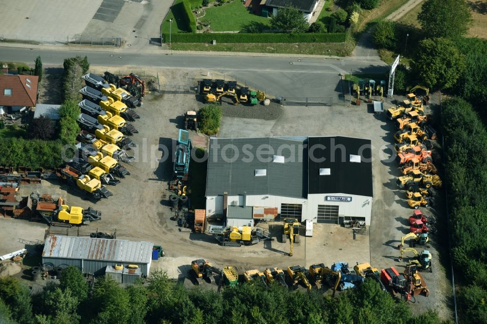 Aerial image Breitenfelde - Building and production halls on the premises of STRIMAK Baumaschinen und Kraftfahrzeuge GmbH an der Bergkoppel in Breitenfelde in the state Schleswig-Holstein