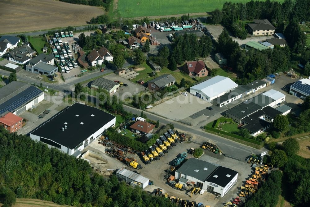 Breitenfelde from above - Building and production halls on the premises of STRIMAK Baumaschinen und Kraftfahrzeuge GmbH an der Bergkoppel in Breitenfelde in the state Schleswig-Holstein