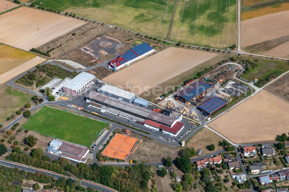 Gössenheim from the bird's eye view: Building and production halls on the premises of Systec System Anlagetechnik GmbH & Co.KG Am Sportplatz in Goessenheim in the state Bavaria, Germany