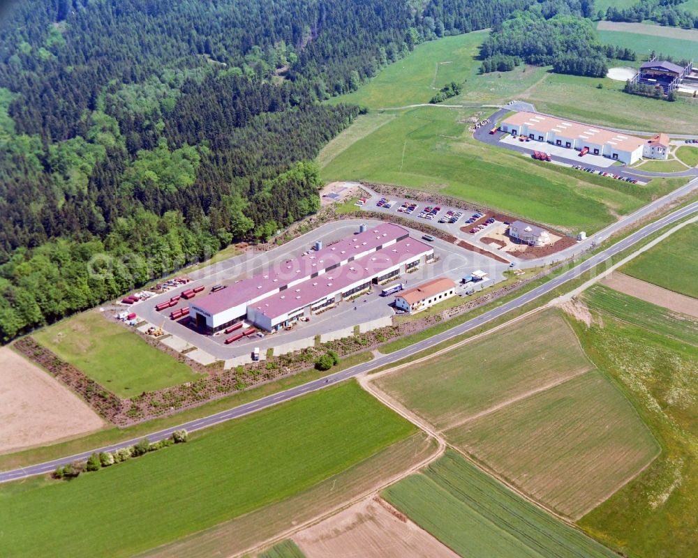 Schondra from the bird's eye view: Building and production halls on the premises of Tank- u. Stahlbau Abersfelof GmbH & Co. KG ba in Schildeck in the state Bavaria, Germany