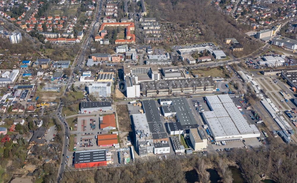 Berlin from the bird's eye view: Building and production halls on the premises of TDK Sensors AG & Co. KG on street Beeskowdamm in the district Lichterfelde in Berlin, Germany