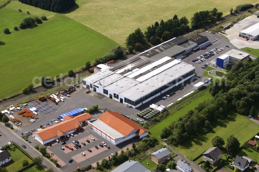 Weitefeld from above - Building and production halls on the premises of THIELMANN WEW GmbH on Ringstrasse in Weitefeld in the state Rhineland-Palatinate, Germany