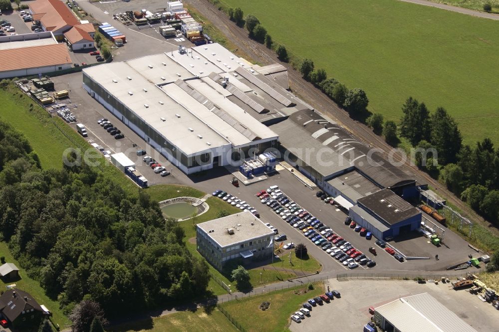 Weitefeld from the bird's eye view: Building and production halls on the premises of THIELMANN WEW GmbH on Ringstrasse in Weitefeld in the state Rhineland-Palatinate, Germany