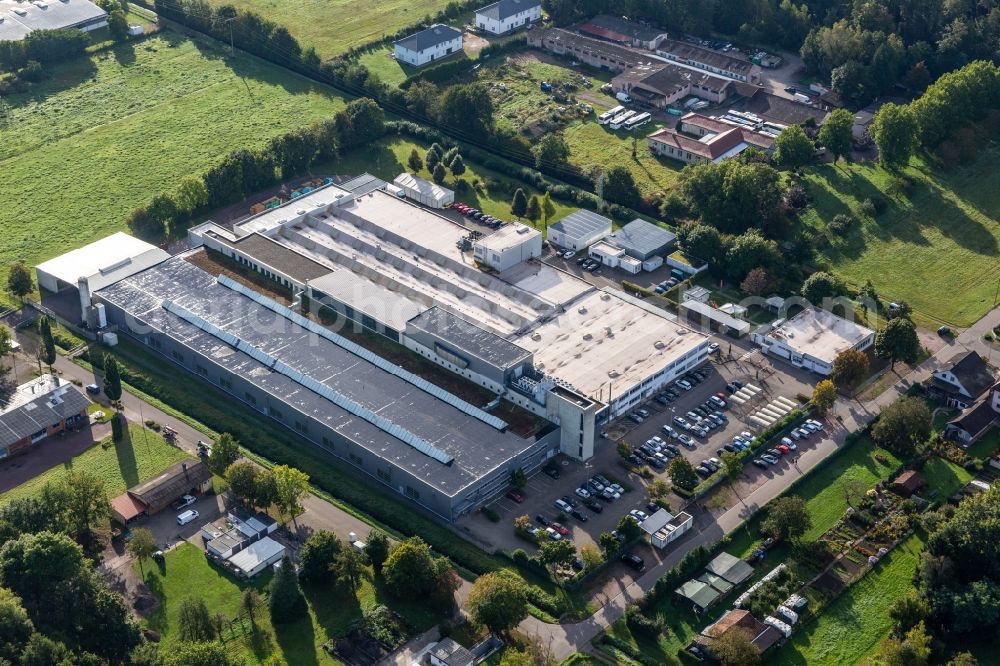 Wörth am Rhein from the bird's eye view: Building and production halls on the premises of Unternehmens Webasto Mechatronics in Schaidt in the state Rhineland-Palatinate, Germany