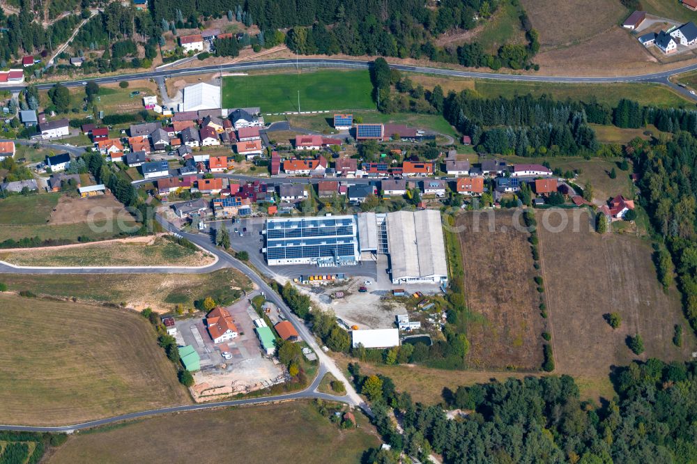 Aura im Sinngrund from above - Building and production halls on the premises of Viant Aura GmbH and of COVERIT EPDM-Abdichtungstechnik GmbH on Struthberg in Aura im Sinngrund in the state Bavaria, Germany