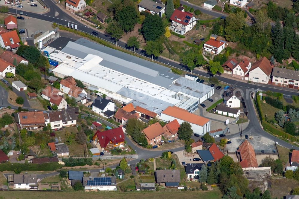 Aerial photograph Aura im Sinngrund - Building and production halls on the premises of the Viant Aura GmbH along the Staatsstrasse on Struthberg in the district Deutelbach in Aura im Sinngrund in the state Bavaria, Germany