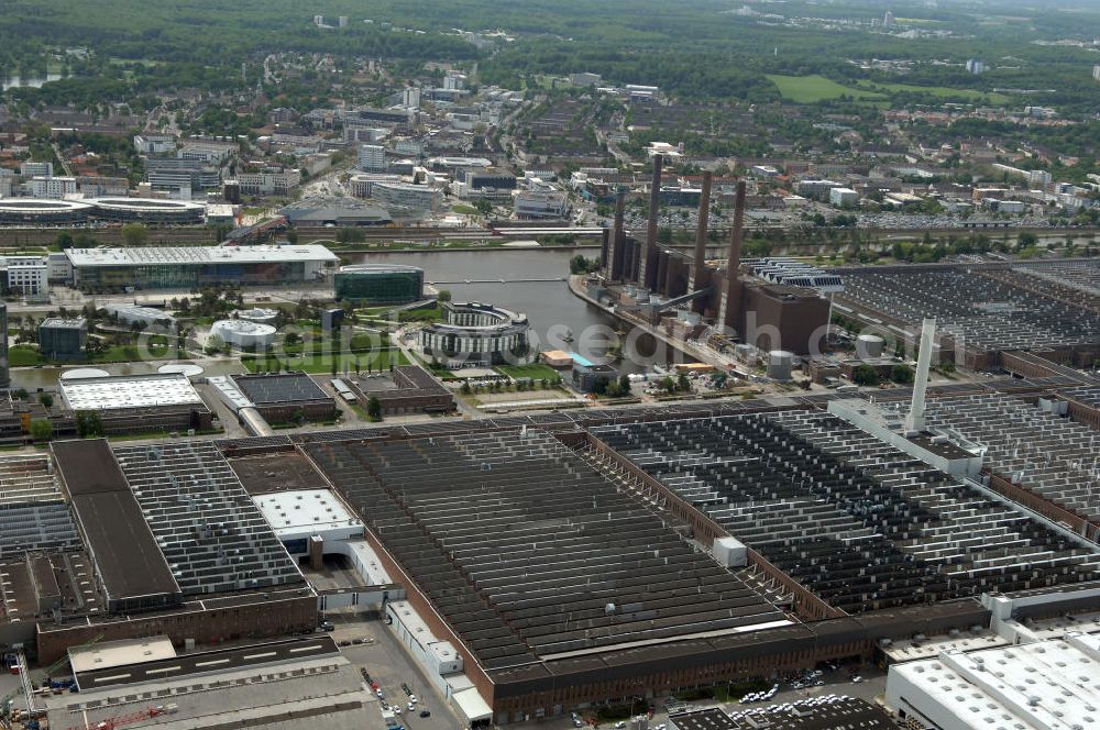 Aerial photograph Wolfsburg - Blick auf das VW - Werksgelände der Volkswagen - Werke in Wolfsburg. Die Volkswagen AG, abgekürzt VW AG, mit Sitz in Wolfsburg, ist die Muttergesellschaft des Volkswagen-Konzerns und der größte Automobilhersteller Europas. View of the VW - Volkswagen factory premises - Works in Wolfsburg. Volkswagen AG, abbreviated VW AG, headquartered in Wolfsburg, is the parent company of the Volkswagen group and the largest car manufacturer in Europe.