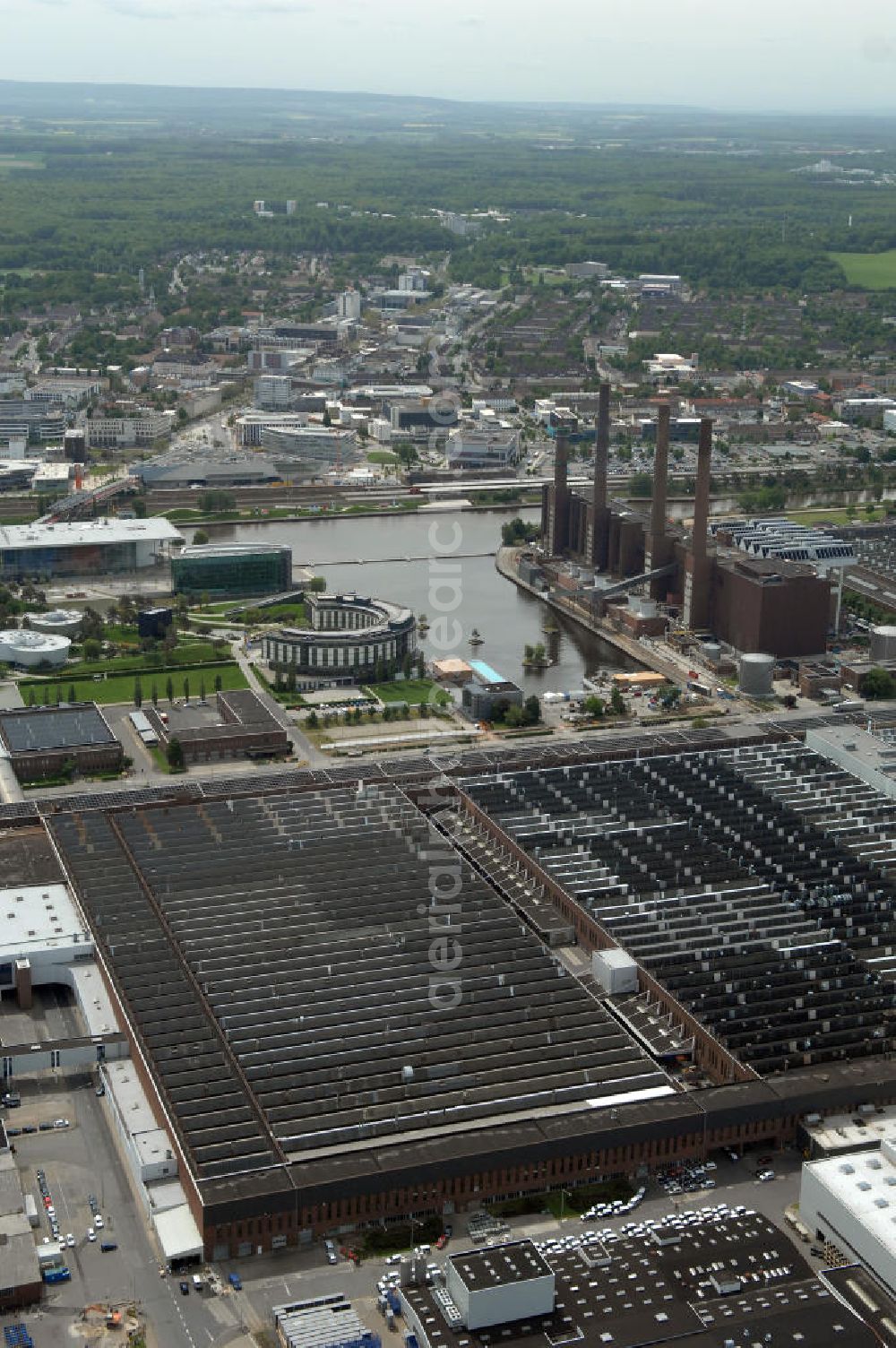 Aerial image Wolfsburg - Blick auf das VW - Werksgelände der Volkswagen - Werke in Wolfsburg. Die Volkswagen AG, abgekürzt VW AG, mit Sitz in Wolfsburg, ist die Muttergesellschaft des Volkswagen-Konzerns und der größte Automobilhersteller Europas. View of the VW - Volkswagen factory premises - Works in Wolfsburg. Volkswagen AG, abbreviated VW AG, headquartered in Wolfsburg, is the parent company of the Volkswagen group and the largest car manufacturer in Europe.