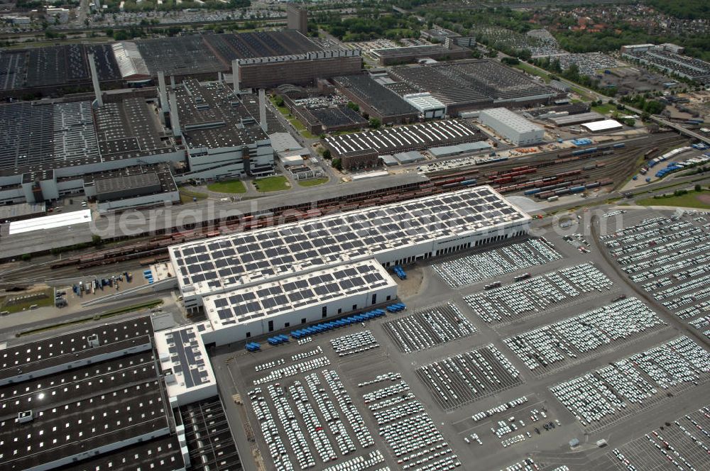 Wolfsburg from the bird's eye view: Blick auf das VW - Werksgelände der Volkswagen - Werke in Wolfsburg. Die Volkswagen AG, abgekürzt VW AG, mit Sitz in Wolfsburg, ist die Muttergesellschaft des Volkswagen-Konzerns und der größte Automobilhersteller Europas. View of the VW - Volkswagen factory premises - Works in Wolfsburg. Volkswagen AG, abbreviated VW AG, headquartered in Wolfsburg, is the parent company of the Volkswagen group and the largest car manufacturer in Europe.