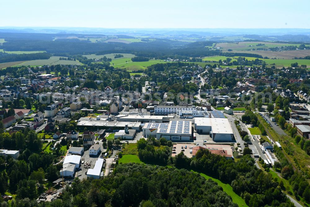 Aerial image Treuen - Building and production halls on the premises of VOWALON Beschichtung GmbH on street Bahnhofstrasse - Ostrastrasse in Treuen in the state Saxony, Germany