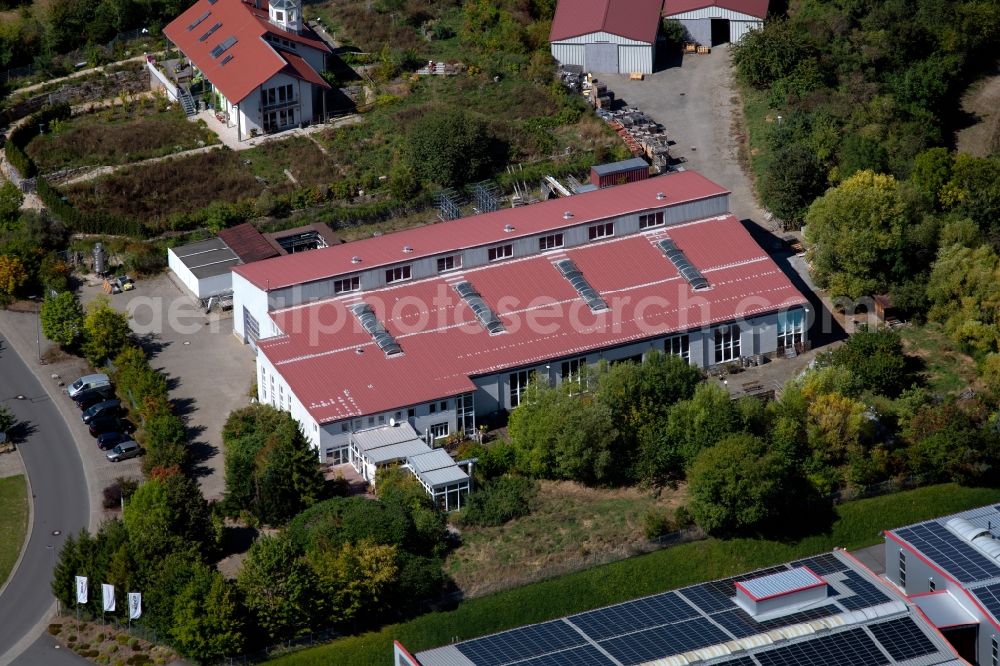 Grünsfeld from above - Building and production halls on the premises of WAIWELDAI Anlagentechnik GmbH at Waltersberg in Gruensfeld in the state Baden-Wurttemberg, Germany