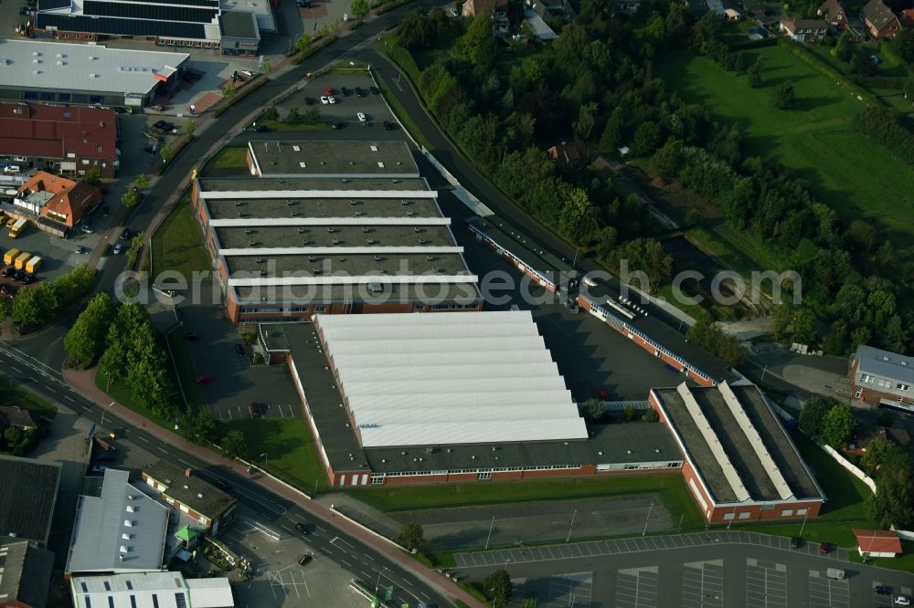 Aerial photograph Aurich - Building and production halls on the premises of WIMA of the Westermann Aurich GmbH in Aurich in the state Lower Saxony