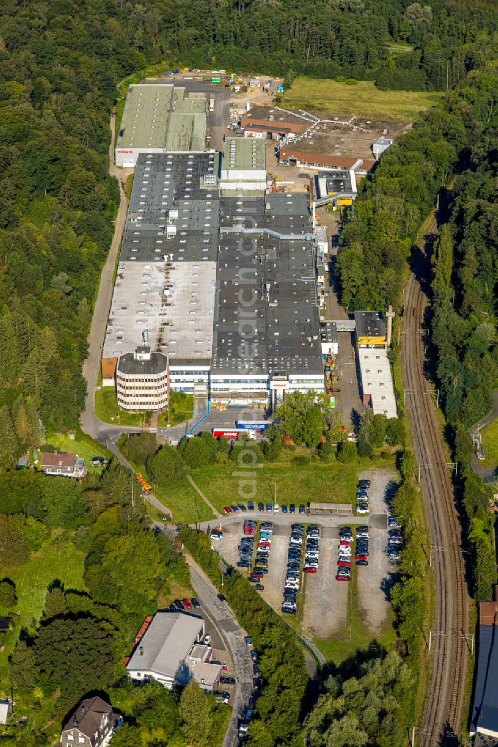 Velbert from the bird's eye view: Building and production halls on the premises of Wieland-Werke AG on Ziegeleiweg in the district Langenberg in Velbert in the state North Rhine-Westphalia, Germany