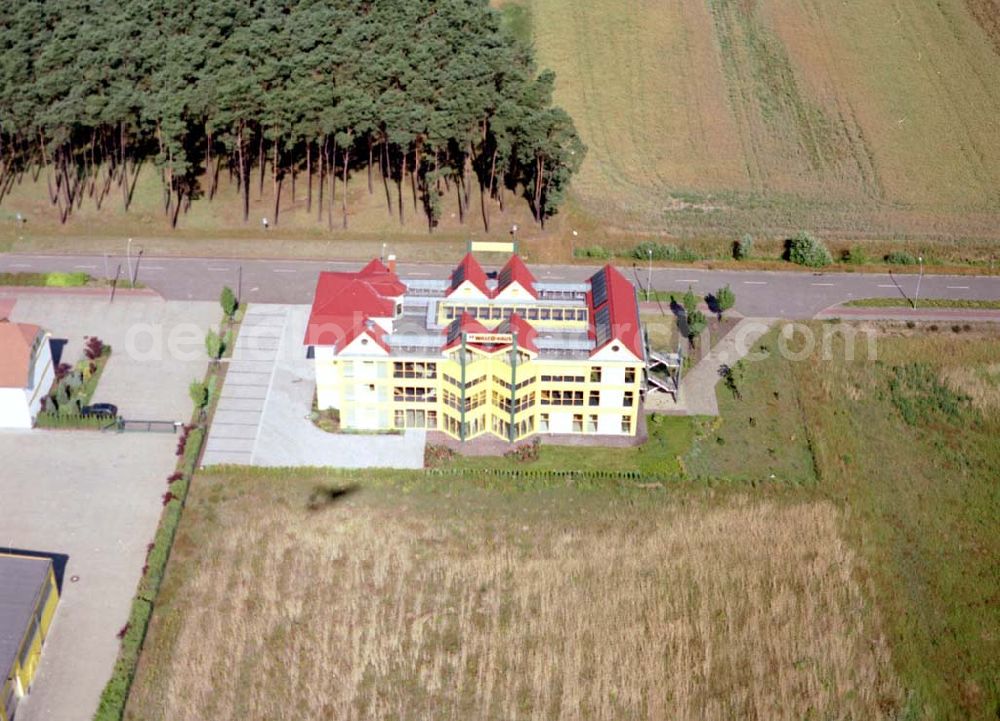 Aerial photograph Freiwalde / BRB - Werksgelände der WILLCO-Haus GmbH & Co - KG Am Stieg 19 in 15910 Freiwalde an der Autobahnabfahrt. Tel.: 035474-200-0