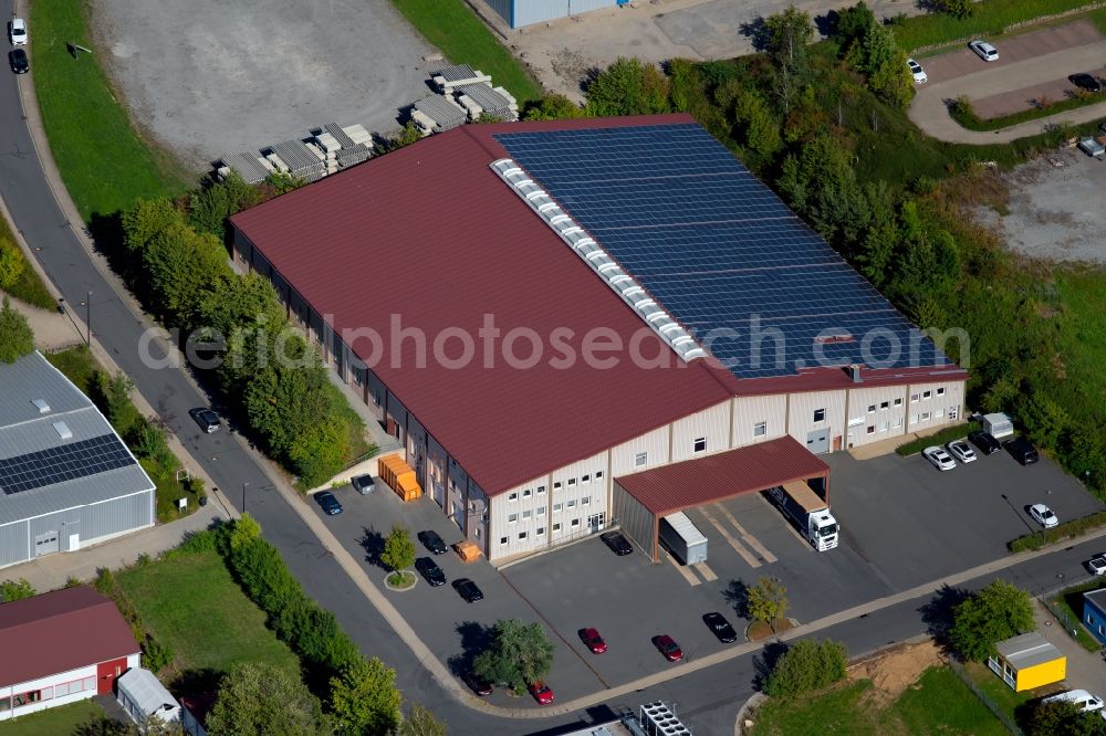 Osterburken from the bird's eye view: Building and production halls on the premises of Wuerth Adolf GmbH & Co. KG at Industriepark in Osterburken in the state Baden-Wurttemberg, Germany