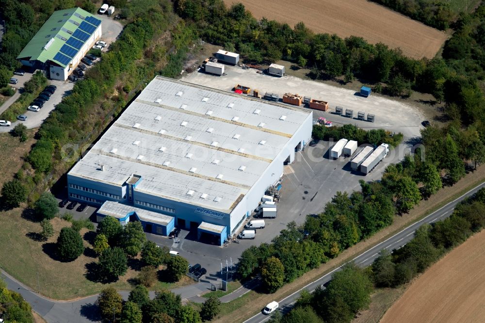 Grünsfeld from above - Building and production halls on the premises of Wuetschner Fahrzeugteile GmbH Rudolf-Diesel-Strasse in Gruensfeld in the state Baden-Wurttemberg, Germany