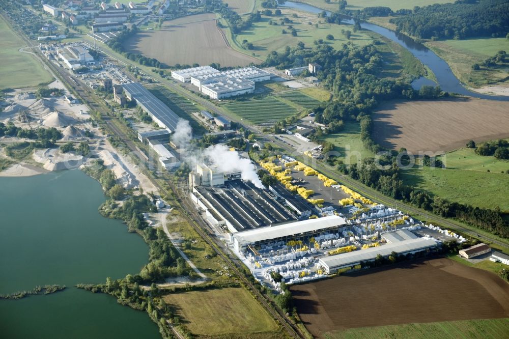 Laußig from the bird's eye view: Building and production halls on the premises of Xella Deutschland GmbH on Landstrasse in Laussig in the state Saxony, Germany