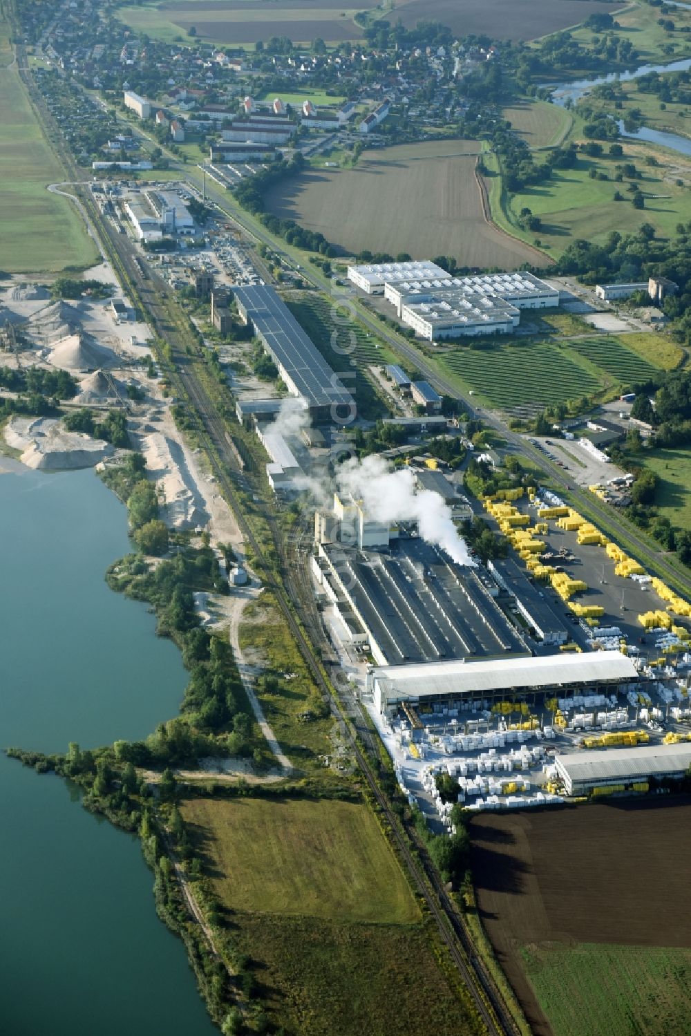 Aerial image Laußig - Building and production halls on the premises of Xella Deutschland GmbH on Landstrasse in Laussig in the state Saxony, Germany