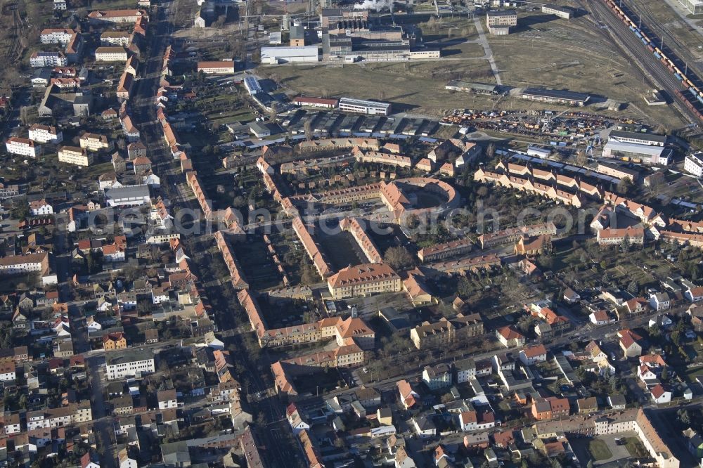 Wittenberg Ortsteil Piesteritz from above - The Piesteritzer employee housing is the largest car-free housing development in Germany. From 1916 to 1919, the garden city was built to plans by Paul Schmitthenner and Otto Rudolf Salvisberg for about 2000 employees of the adjacent nitrogen plant. It was recorded in 1986 in the list of monuments of the GDR and has since become a historical monument