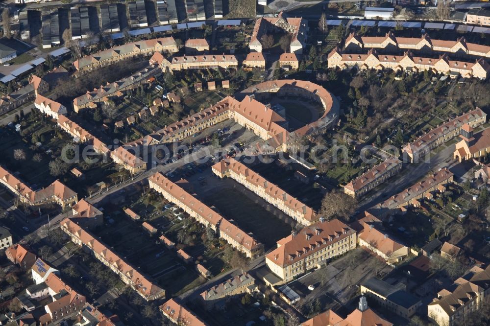 Aerial image Wittenberg Ortsteil Piesteritz - The Piesteritzer employee housing is the largest car-free housing development in Germany. From 1916 to 1919, the garden city was built to plans by Paul Schmitthenner and Otto Rudolf Salvisberg for about 2000 employees of the adjacent nitrogen plant. It was recorded in 1986 in the list of monuments of the GDR and has since become a historical monument