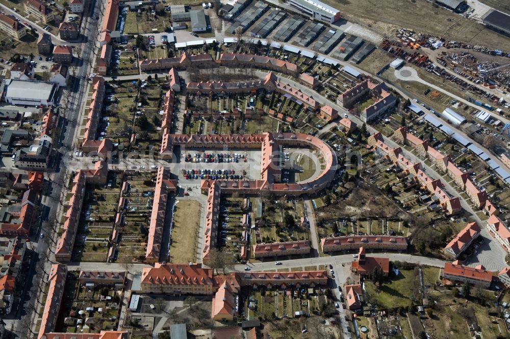 Wittenberg OT Piesteritz from the bird's eye view: The Piesteritzer employee housing is the largest car-free housing development in Germany. From 1916 to 1919, the garden city was built to plans by Paul Schmitthenner and Otto Rudolf Salvisberg for about 2000 employees of the adjacent nitrogen plant. It was recorded in 1986 in the list of monuments of the GDR and has since become a historical monument