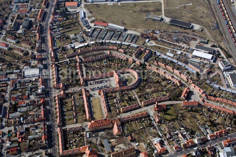 Aerial image Wittenberg OT Piesteritz - The Piesteritzer employee housing is the largest car-free housing development in Germany. From 1916 to 1919, the garden city was built to plans by Paul Schmitthenner and Otto Rudolf Salvisberg for about 2000 employees of the adjacent nitrogen plant. It was recorded in 1986 in the list of monuments of the GDR and has since become a historical monument