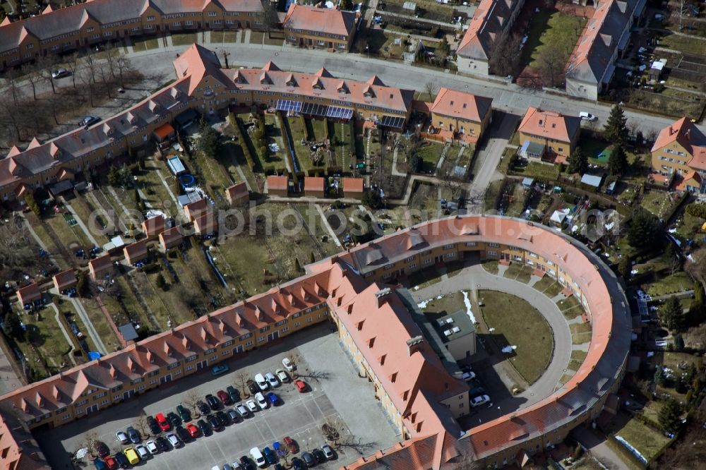 Aerial photograph Wittenberg OT Piesteritz - The Piesteritzer employee housing is the largest car-free housing development in Germany. From 1916 to 1919, the garden city was built to plans by Paul Schmitthenner and Otto Rudolf Salvisberg for about 2000 employees of the adjacent nitrogen plant. It was recorded in 1986 in the list of monuments of the GDR and has since become a historical monument