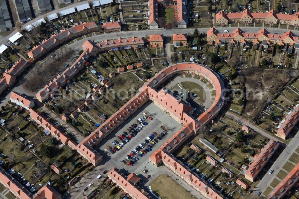 Wittenberg OT Piesteritz from above - The Piesteritzer employee housing is the largest car-free housing development in Germany. From 1916 to 1919, the garden city was built to plans by Paul Schmitthenner and Otto Rudolf Salvisberg for about 2000 employees of the adjacent nitrogen plant. It was recorded in 1986 in the list of monuments of the GDR and has since become a historical monument