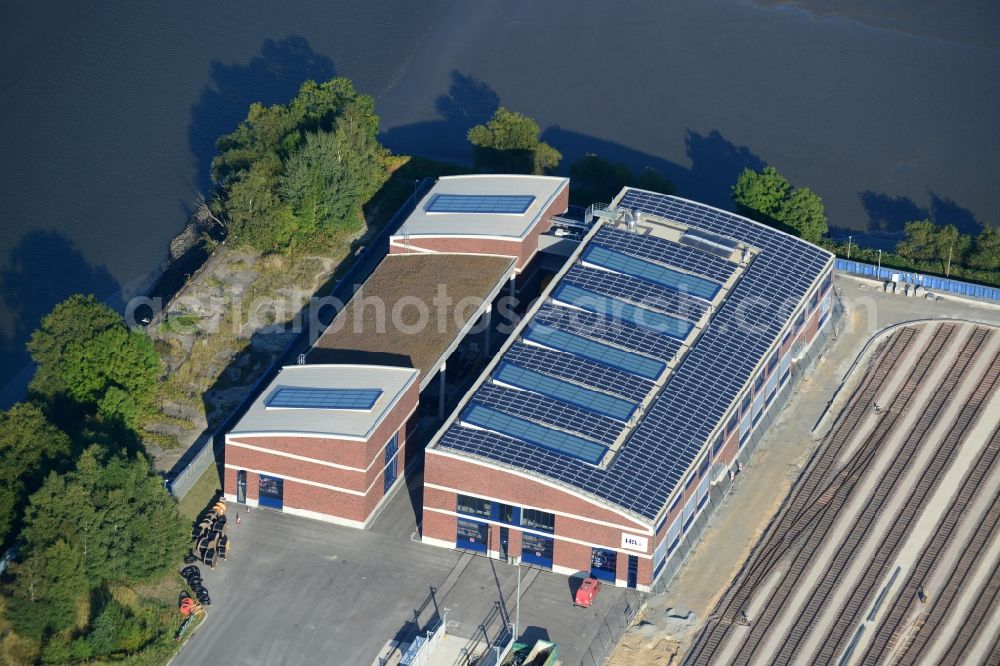 Hamburg from above - Workshop hall Technical operation of the port railway on the Spree harbour Island in Hamburg-Mitte / Kleiner Grasbrook. A project of the Hamburg Port Authority HPA