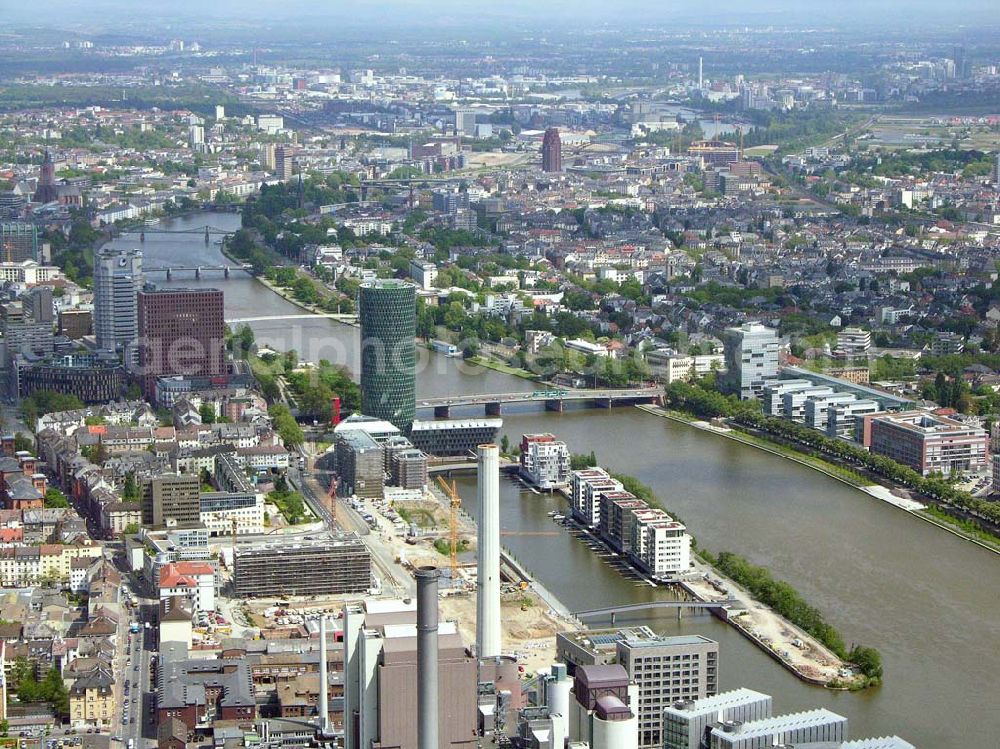 Aerial photograph Frankfurt - Main / Hessen - Blick auf den Westhafen in Frankfurt/ Main. Im Vordergrund ist das Elektrizitätswerk und im Hintergrund ist der Westhafen Tower zu sehen. Das Elektrizitätswerk wird betrieben von der : Mainova AG, Solmsstraße 38, 60623 Frankfurt am Main Tel.: 069/ 213-02 Fax.: 069 /213-81122