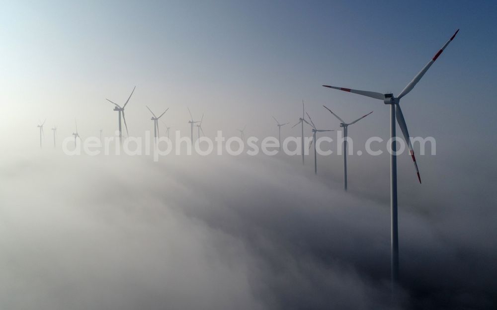 Aerial image Jacobsdorf - Weather-induced wind energy installations embedded in a fog layer in Jacobsdorf in the state Brandenburg, Germany