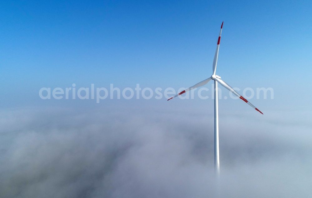 Aerial image Jacobsdorf - Weather-induced wind energy installations embedded in a fog layer in Jacobsdorf in the state Brandenburg, Germany