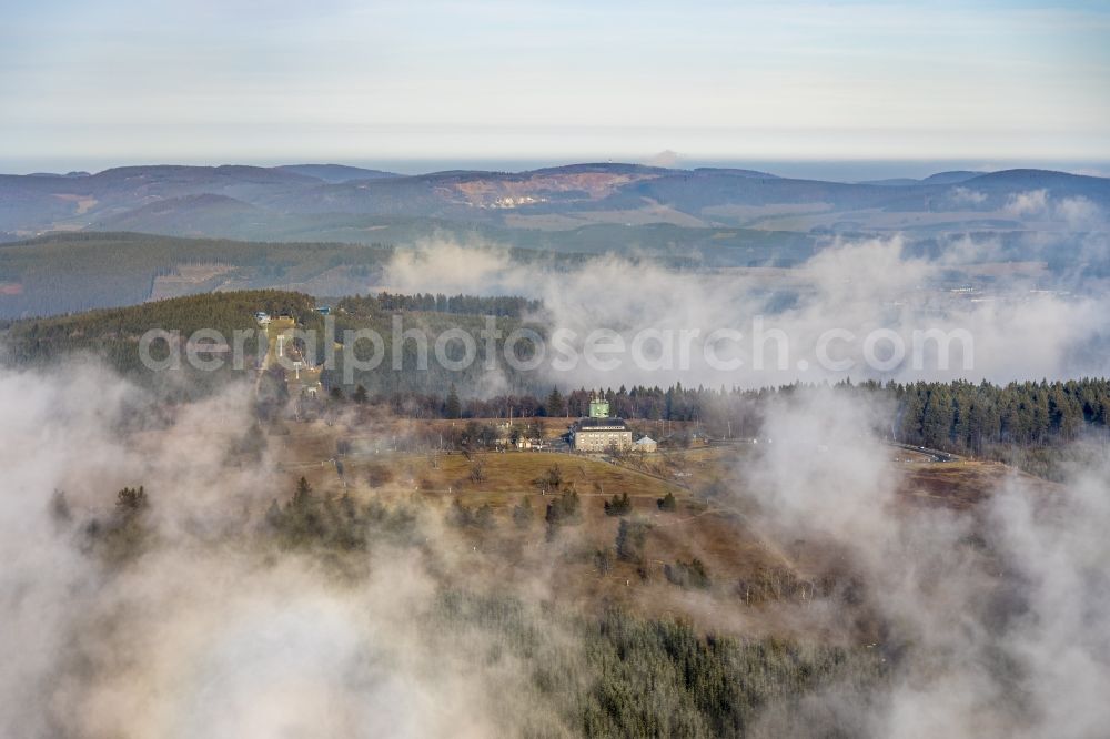 Winterberg from the bird's eye view: Weather with layered fog cover ueber dem Forschungs- Gebaeude Deutscher Wetterdienst Kahler Asten in Winterberg in the state North Rhine-Westphalia, Germany