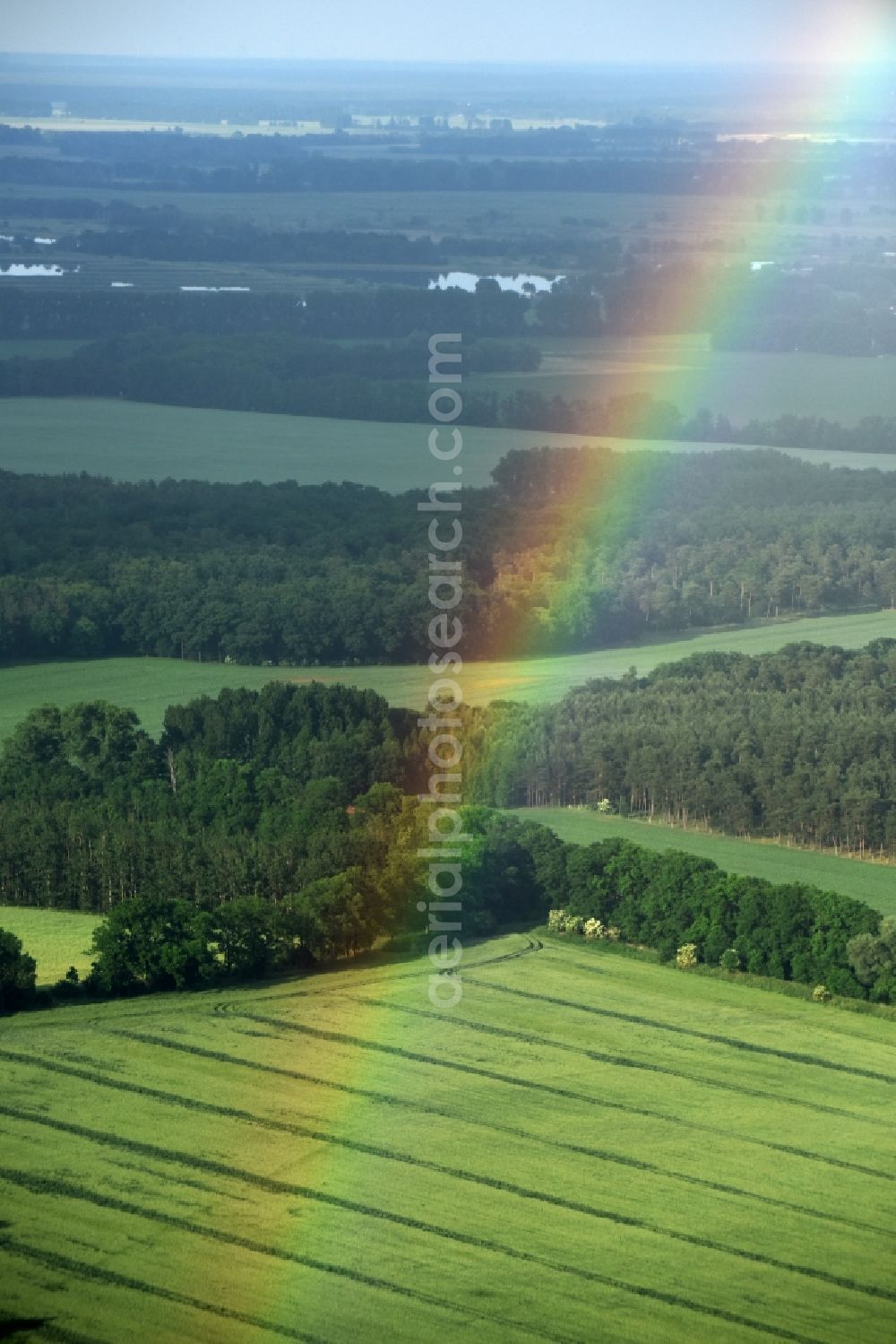 Aerial image Fehrbellin - Haze and precipitation conditions with rainbow formation in Fehrbellin in the state Brandenburg