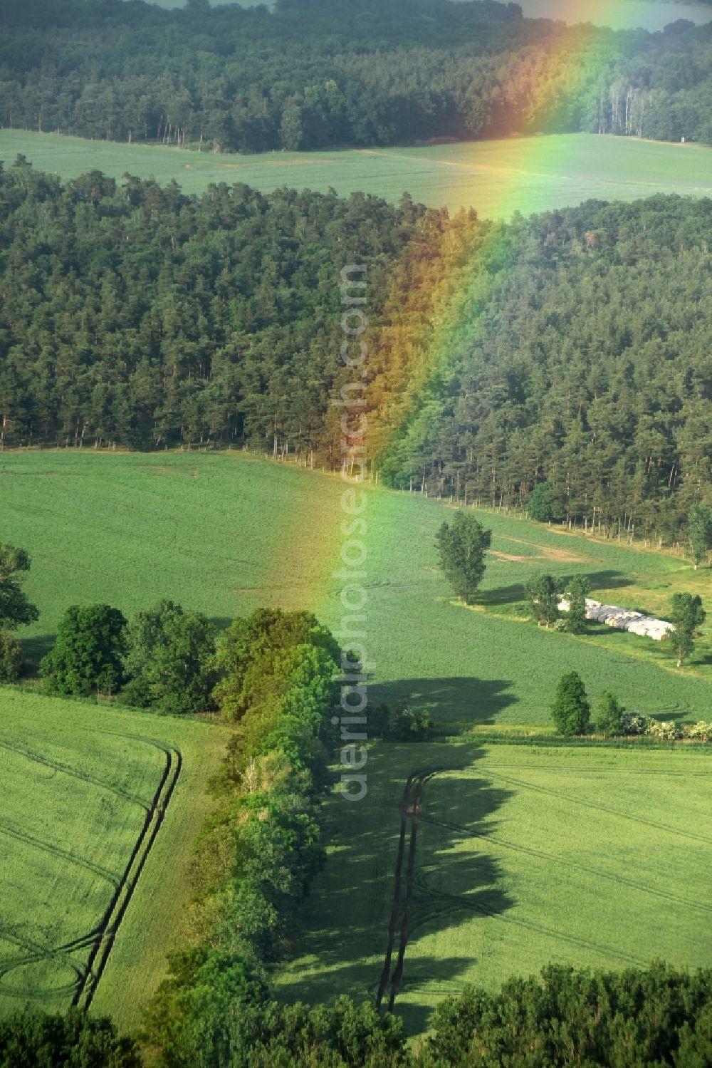 Aerial image Fehrbellin - Haze and precipitation conditions with rainbow formation in Fehrbellin in the state Brandenburg