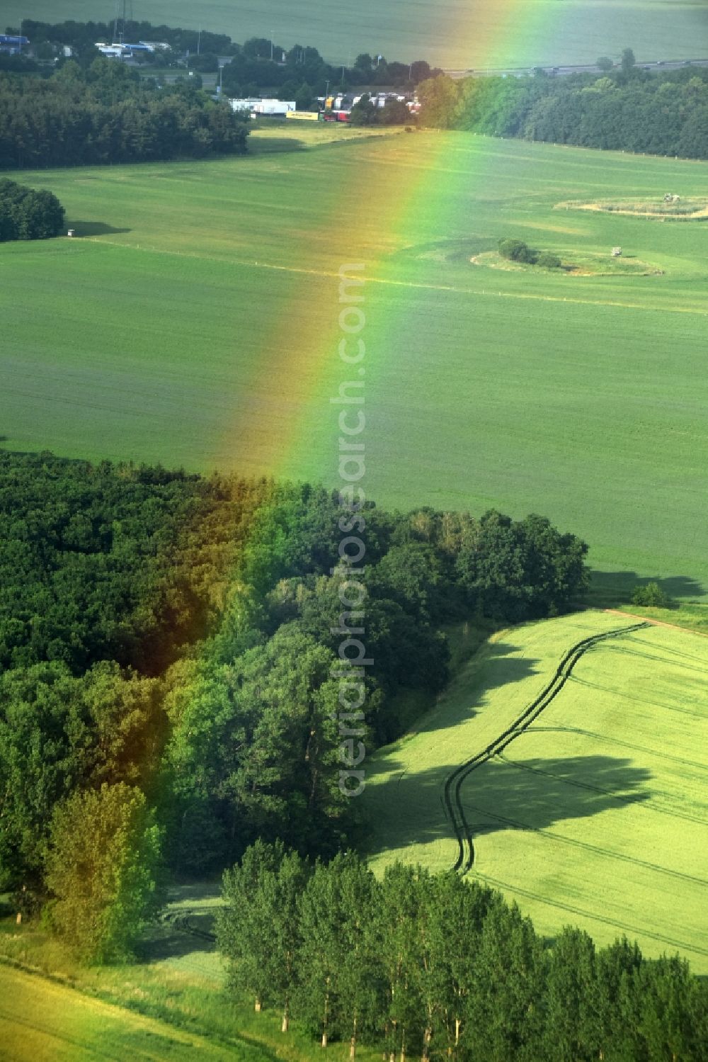 Fehrbellin from above - Haze and precipitation conditions with rainbow formation in Fehrbellin in the state Brandenburg