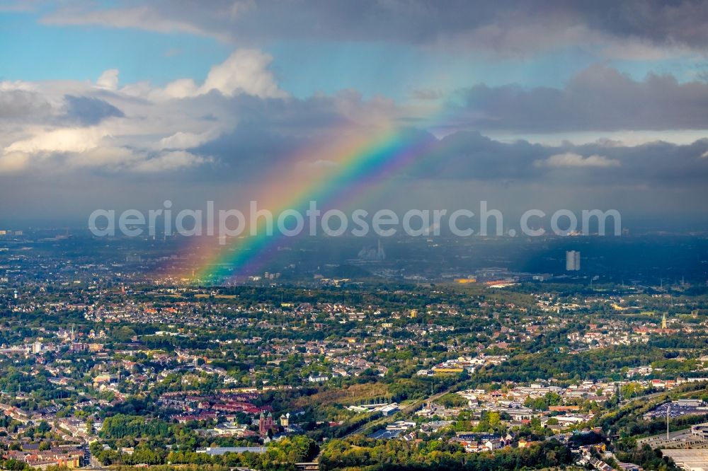 Essen from the bird's eye view: Haze and precipitation conditions with rainbow formation in the district Bergeborbeck in Essen in the state North Rhine-Westphalia, Germany