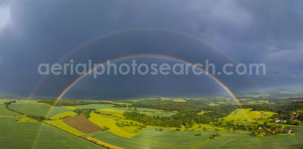 Reitzendorf from above - Haze and precipitation conditions with rainbow formation in Reitzendorf in the state Saxony, Germany